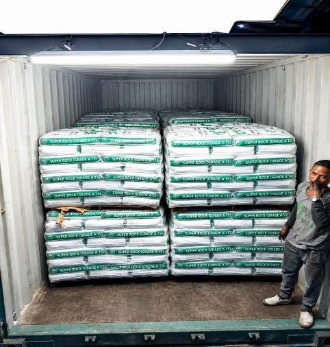 Excel Plast cement bags stacked inside a shipping container