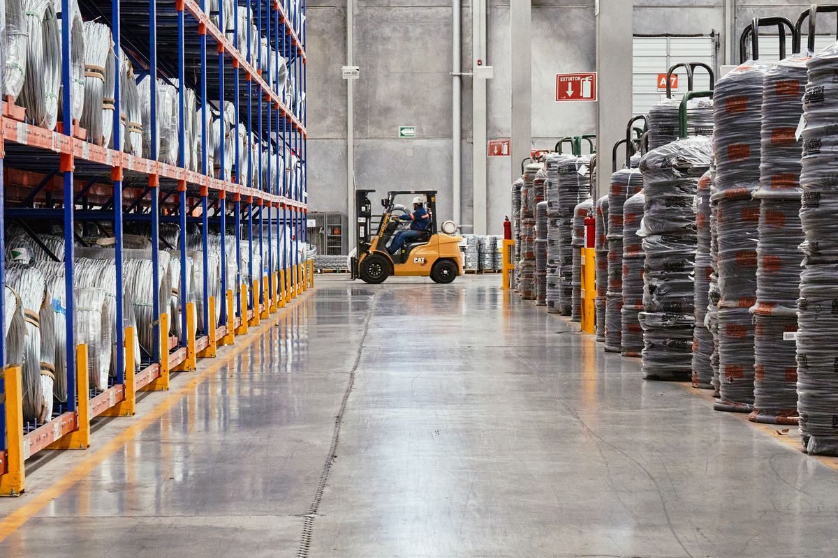 Warehouse aisle with racked pallets